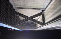 Pigeon netting between I beams on freeway underpass