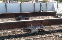 Pigeon poop all over gas station canopy can ruin a canopy by eatting through the metal in the gutters