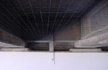 Pigeon control netting to exclude the pigeons from under freeway underpass