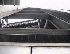 Netting of the side emergency stairwalls that housed dozens of pigeons