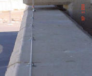 Close up of cable system that holds up the pigeon control netting