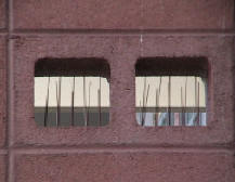 Pigeon exclusion spike installed inside of block